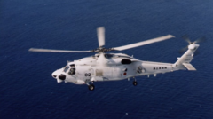 Japan navy crew missing after deadly helicopter crash